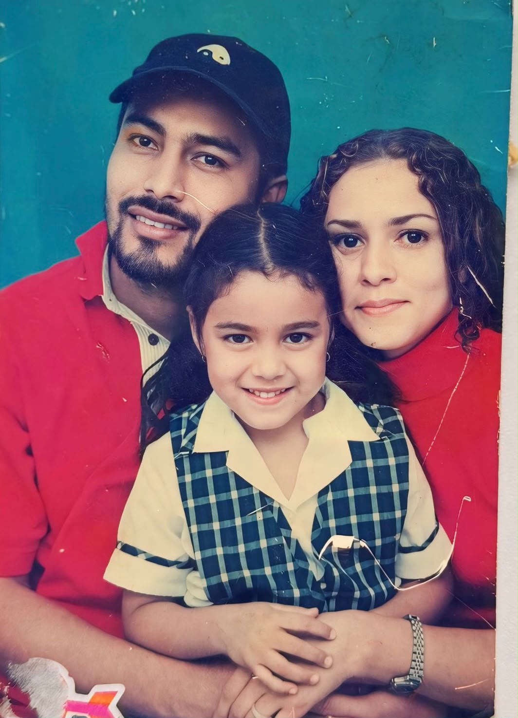 Camila con sus padres